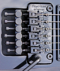 Understanding the Floyd Rose Tremolo: Setup, Tuning, and Optimization
