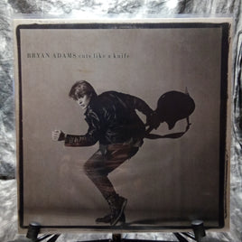 Bryan Adams-cuts like a knife